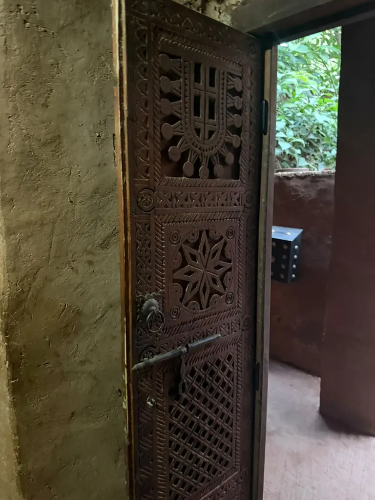 A carved wooden door in a Berber house